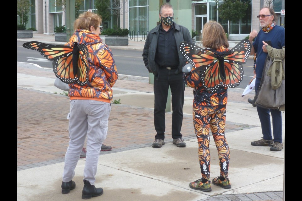 Waiting for the last two runners at Barrie City Hall