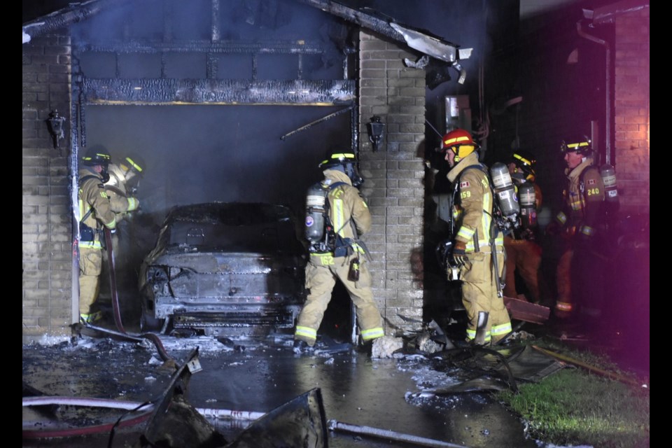 Fire destroyed a garage and car on Barrie's Hickling Trail Saturday night.