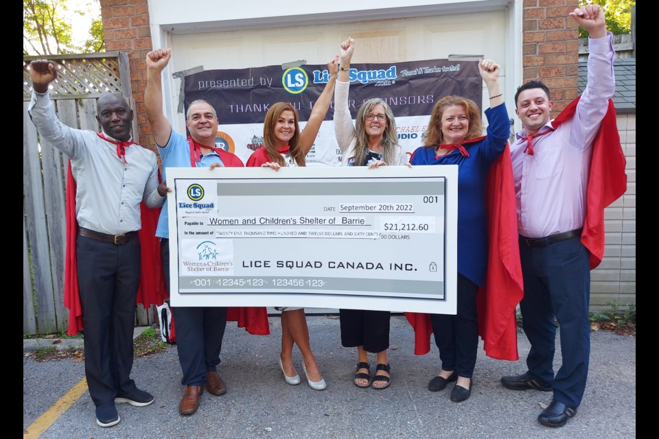 The Women & Children's Shelter Barrie was presented with a cheque for more than $21,000 on Tuesday, Sept. 20 that was raised through a recent sky diving charity jump and 80s Party - hosted by Lice Squad. From left to right: Patrick Harriot Stewart, Ben Cupello, Dawn Mucci, shelter executive director Teresa MacLennan, Sarah Taylor and Anthony De Gasperis.