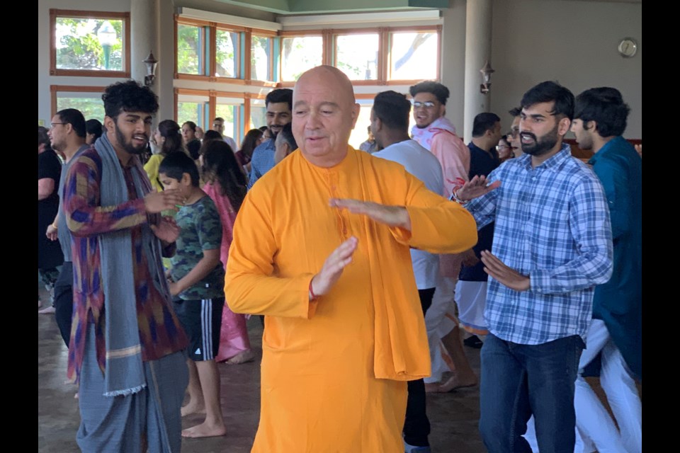 Members of the local Hindu community celebrate with dancing, singing and food during the third annual Festival of Joy.