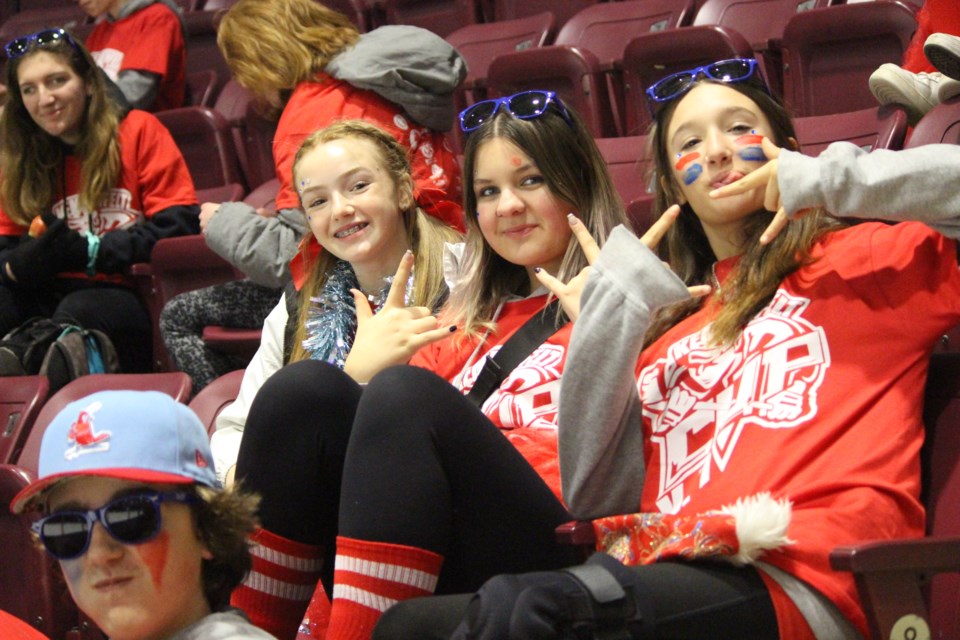 Bear Creek Secondary School students Kenzie Irwin, Olivia Fraser and Paityn Munn were among the more than 2,000 students from around the local area who came out watch some hockey during the seventh annual Kempenfelt Cup on Wednesday.