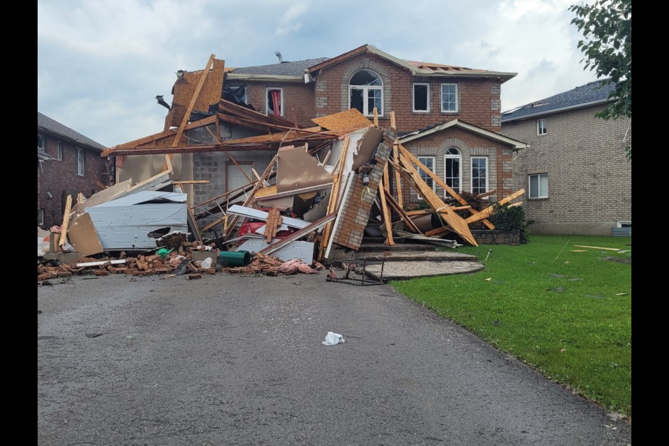 This home on Sun King Crescent saw significant damage in the wake of Thursday's tornado.