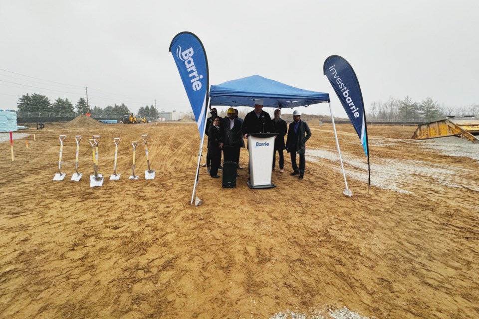 Dignitaries prepare for the official ground-breaking of a new Holiday Inn Express site on Bryne Drive, beside Princess Auto in south Barrie on Friday. 