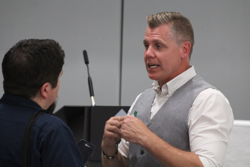 Marty Lancaster, the Green candidate in Barrie-Springwater-Oro-Medonte, talks to BarrieToday reporter Shawn Gibson after last week's Barrie Chamber of Commerce debate. Raymond Bowe/BarrieToday
