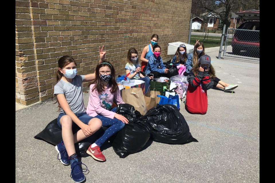 Members of the Codrington P.S. Global Action Team are collecting donations of summer clothing as part of the Barrie Families Unite clothing drive. 