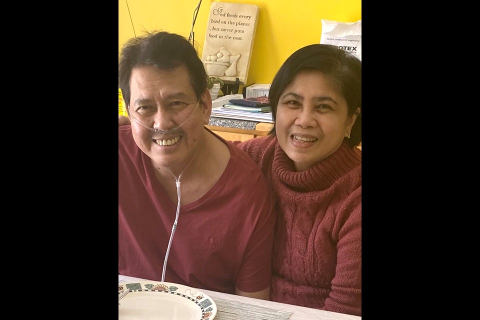 Neil Orpilla and his wife, Estrella, take a moment to relax after his return home from hospital in this recent photo.
