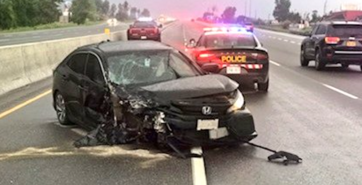 Provincial police are investigating after a vehicle slammed into an OPP vehicle on Highway 400 North Tuesday evening.