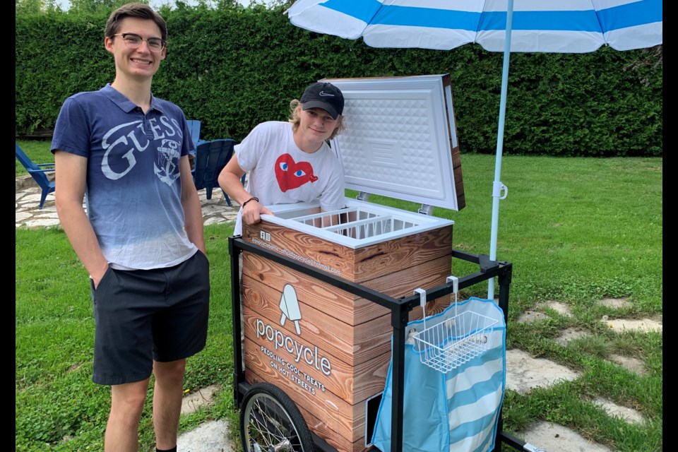 Best friends Nathan Glahn and Zach Hofer are excited to get their new ice cream cart on the road this summer.