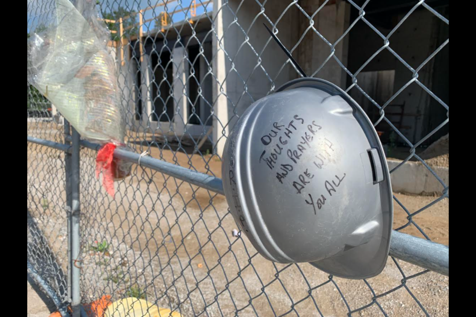 This file photo shows a memorial placed at the Dunlop Street West construction where 52-year-old Corey Phillips of Orillia was killed June 24, 2021. 