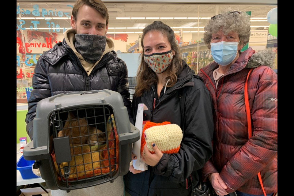 Kiska, a domestic short-haired tabby, found a new home with Colin Birch, Shannen Black and Colleen Black on Saturday. The feline was one of 40 cats and kittens are up for adoption this weekend as part of Furry Friends Barrie's Kittens in Mittens Adoptathon. 