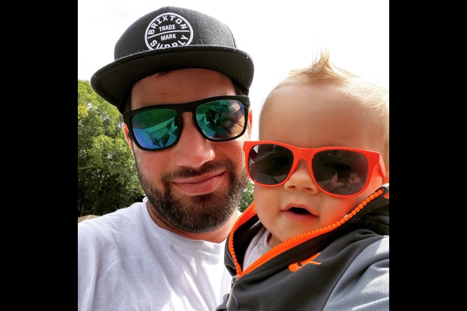 After suffering silently for over a decade with addiction and mental health issues, Corey MacGregor died Saturday, Feb. 20, 2021 of a suspected fentanyl poisoning. He is shown with his young son. 