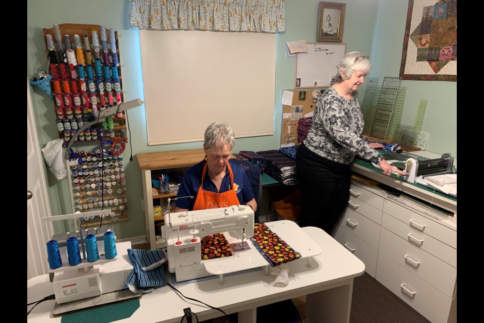 Ann Cavanaugh and Evelyne Stefanison head up the Days For Girls Barrie Team, which consists of local volunteers who sew, serge, iron and pack kits that are distributed to women and girls in developing countries.