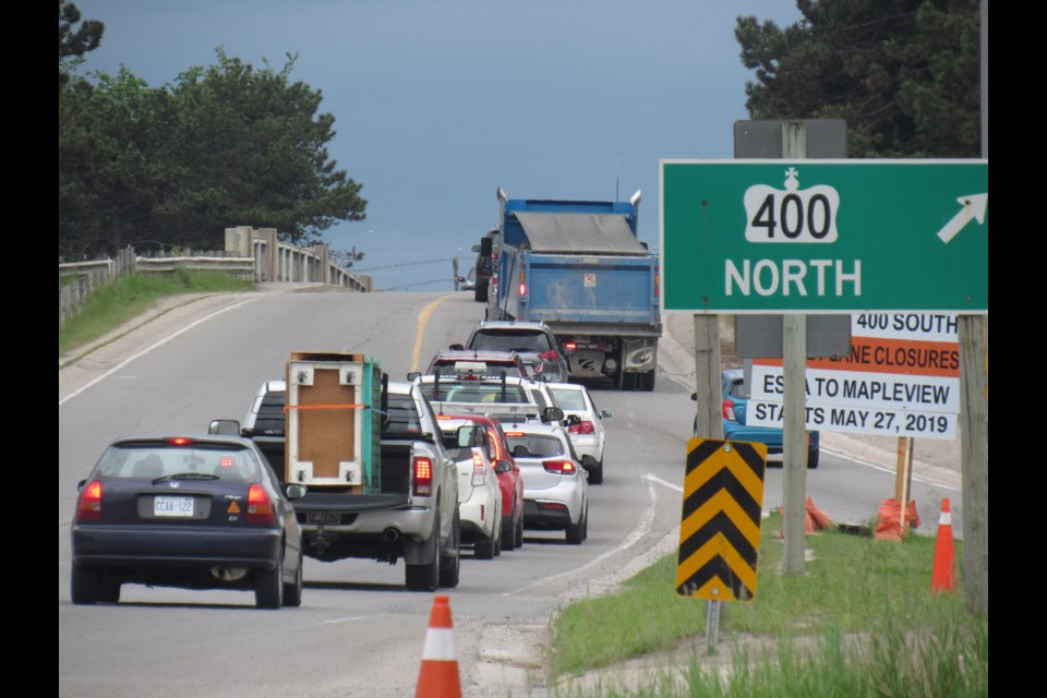 Dunlop Street traffic merges with motorists coming off Highway 400 in Barrie on Friday, June 21, 2019. Shawn Gibson/BarrieToday