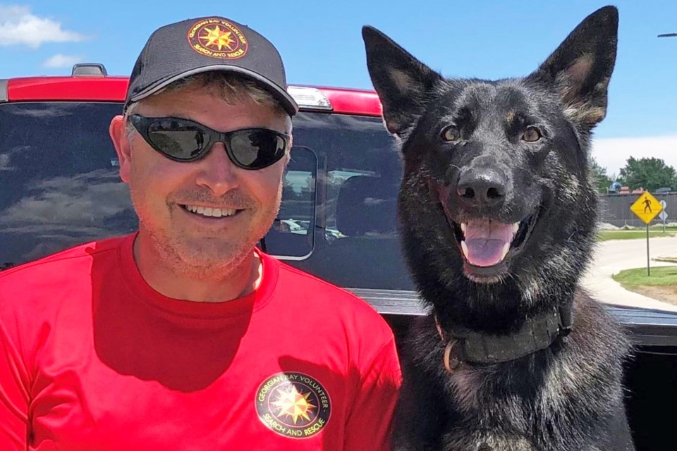 Bruno Baker, a volunteer with the Georgian Bay Volunteer Search and Rescue (GBVSAR) organization based in Barrie, and his trusty sidekick Mikaw.