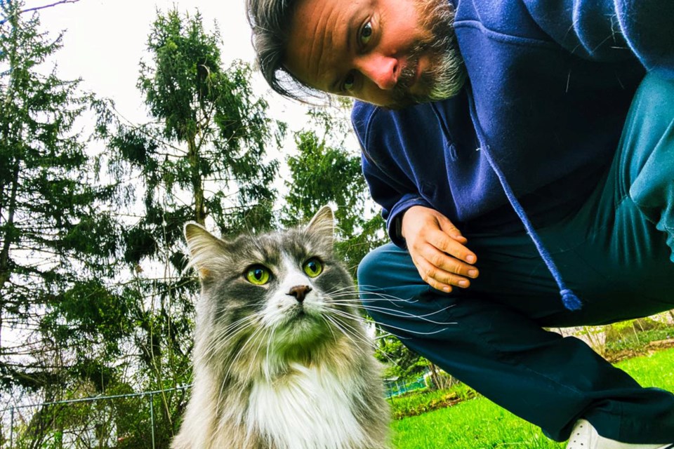 Bob Charters strikes a pose with his rescue pal Dave. 