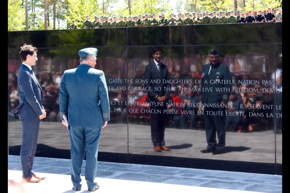 Prime Minister Justin Trudeau and Hon. Col. Jamie Massie pause to reflect on the CFB Borden Legacy Memorial after officially unveiling the wall this morning.
Robin MacLennan/BarrieToday