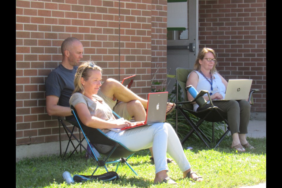Teachers at Eastview Secondary School took to the outdoors last week for online meetings. Shawn Gibson/BarrieToday                               