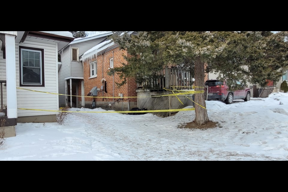 A house on Bayfield Street, just south of Grove Street, remains taped off by police on Wednesday after a double shooting on Tuesday, Feb. 15.