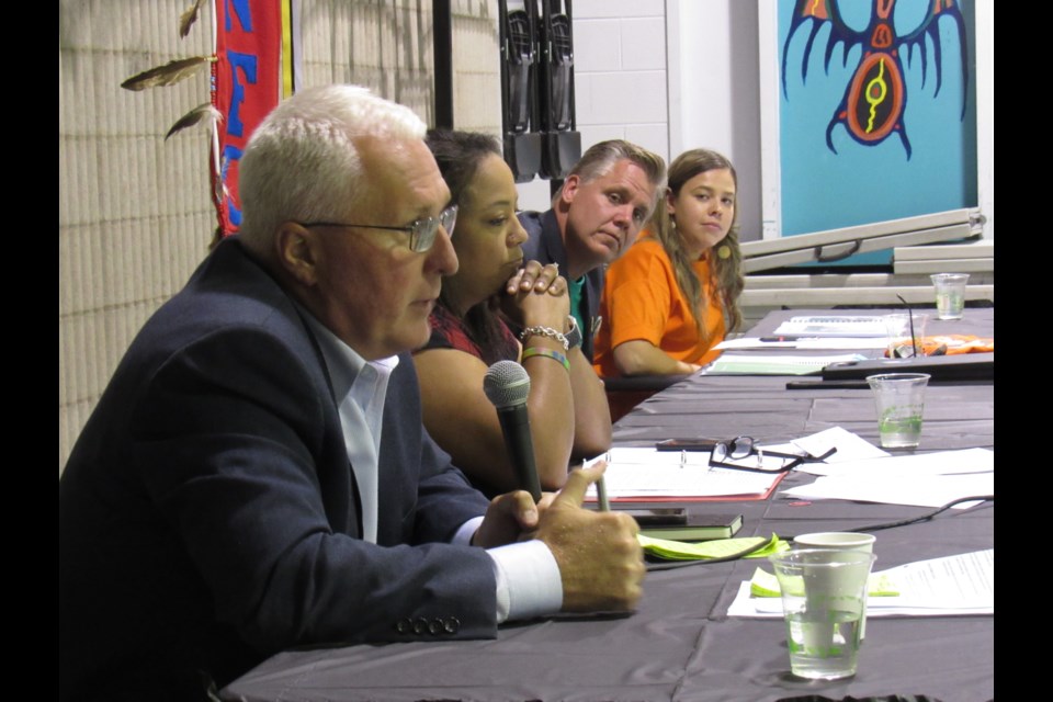 From left, John Brassard (Conservative) answers a question as Lisa-Marie Wilson (Liberal), Marty Lancaster (Green) and Angelique Belcourt (NDP) listen on at the Barrie Native Friendship Centre hosted debate, Friday night. Shawn Gibson/BarrieToday