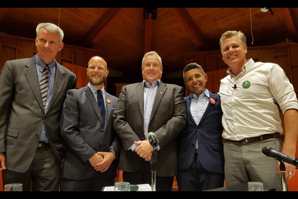 From left, David Patterson (People's Party), Dan Janssen (NDP), Doug Shipley (Conservative), Brian Kalliecharan (Liberal) and Marty Lancaster (Green) pose after their debate Thursday night at Grace United Church. Shawn Gibson/BarrieToday
