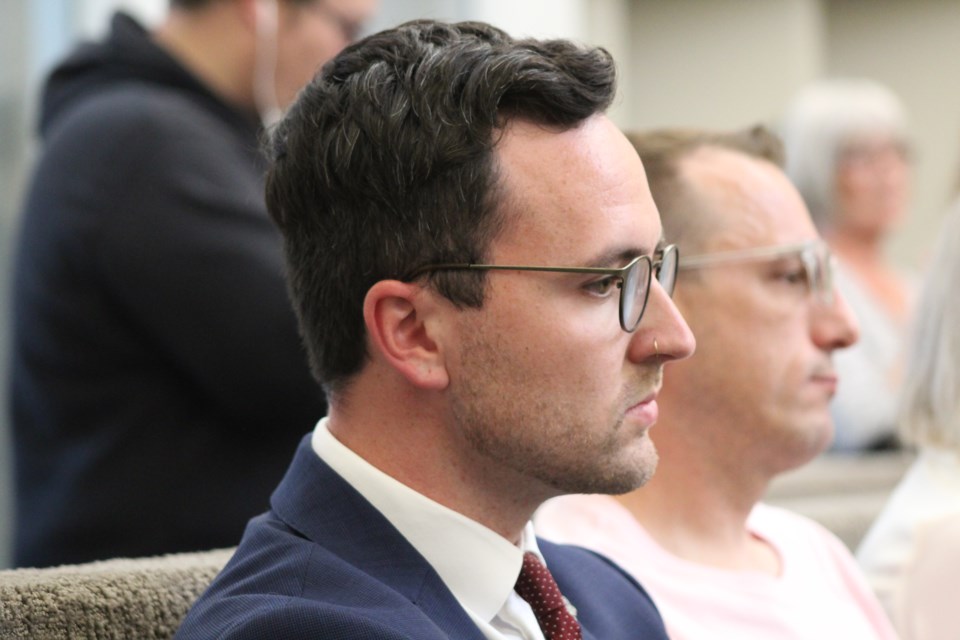 Coun. Keenan Aylwin sits in the gallery at Barrie City Hall on June 11, 2019 while listening to deputations in regard to an integrity commissioner's report into a Facebook post he made earlier this year.  Raymond Bowe/BarrieToday