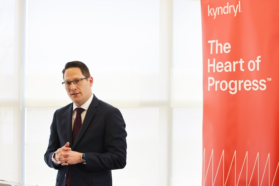 Denis Villeneuve, Kyndryl Canada’s security and resilience practice leader, speaks to a crowd at the company's ribbon-cutting ceremony at its new facility at 505 Bayview Dr. in Barrie on Thursday.