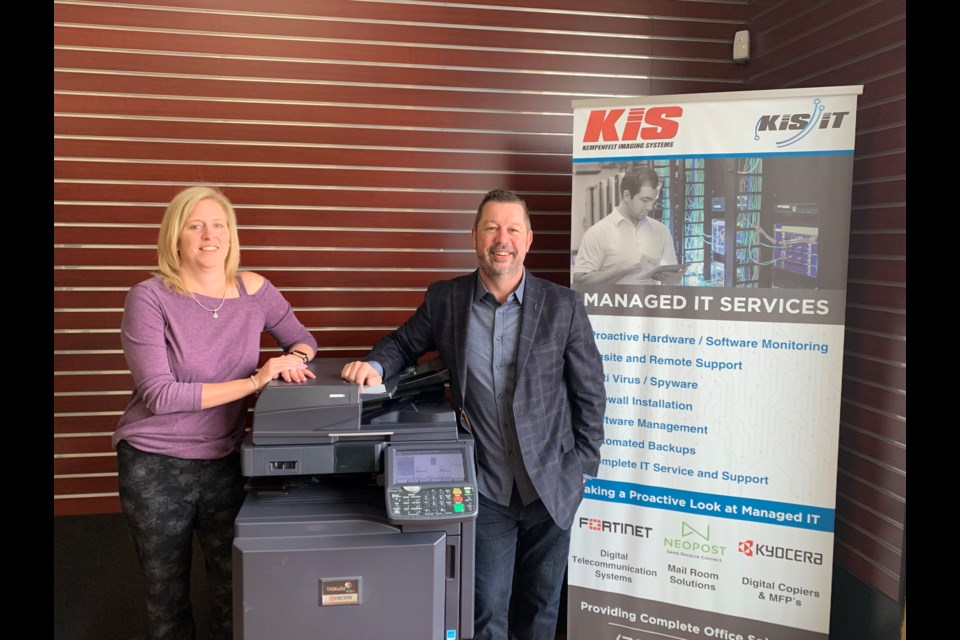 Kempenfelt Imaging Systems vice-president of finance Sheri Patfield, left, and owner Jody Patfield celebrate 20 years of business in Barrie. Submitted photo