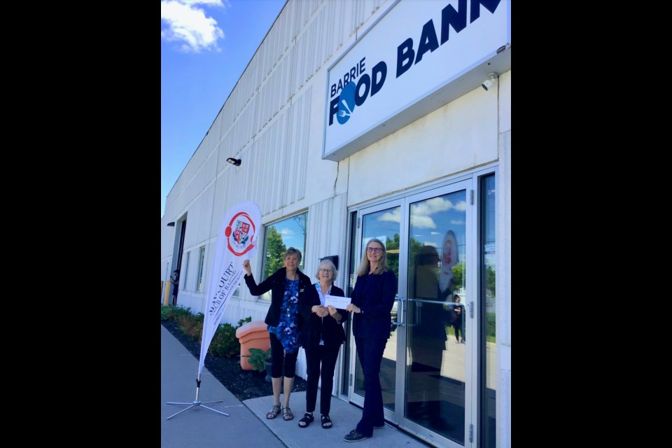 On June 13, the May Court Club of Barrie members presented the Barrie Food Bank with gift cards for groceries valued at $1,175 from the club’s Christmas in June campaign. Pictured are Bev Jackson, vice-president, and Anne Wilson, president of the May Court Club of Barrie, and Sharon Palmer, executive director of the Barrie Food Bank.