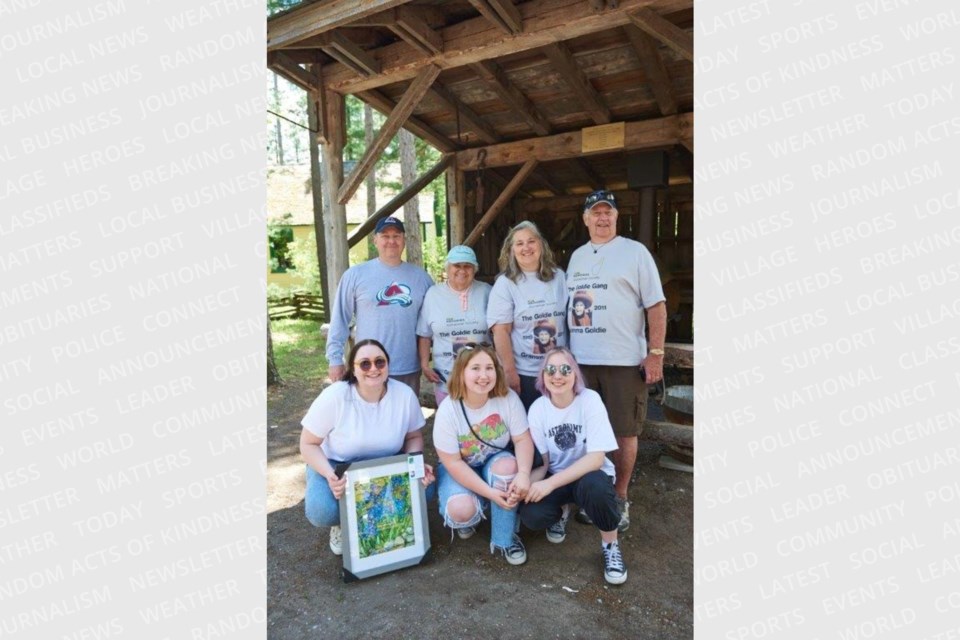 Members of the Goldie Gang gathered in 2022 during the IG Wealth Management Walk for Alzheimer’s, after receiving a forget-me-not print for their ongoing support of the Alzheimer Society of Simcoe County.