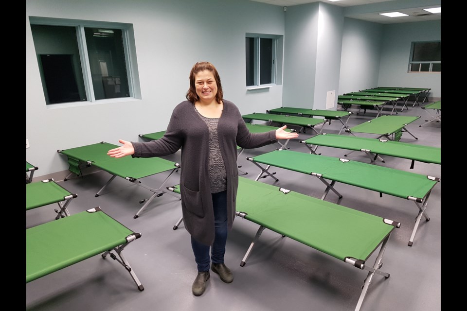 Sara Peddle shows of one of the new sleeping areas in the new David Busby Centre in downtown Barrie. Shawn Gibson/BarrieToday