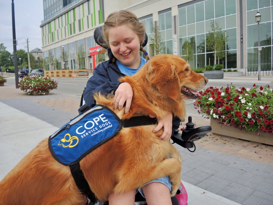 Shelby Cookson and COPE Dog Bic Mac 