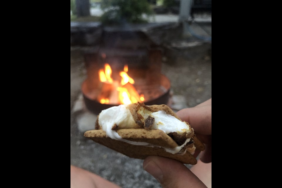 It's quintessential, delicious, and nostalgic. It's called a s'more, but one is usually enough. 