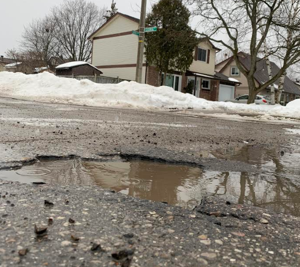 A large pothole at the corner of Gloria Street and Oren Boulevard in north-end Barrie. Raymond Bowe/BarrieToday