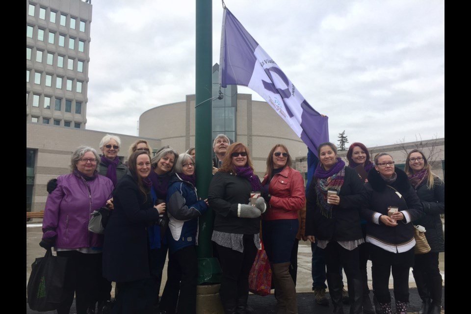 More than a dozen people were at City Hall Friday for a flag-raising for the Women and Children's Shelter of Barrie.
Sue Sgambati/BarrieToday