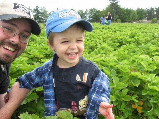 Daniel Clements' son, Tyler, enjoys his first strawberries during a trip to the strawberry patch about 15 years ago. A trip to the strawberry patch remains a cherished family tradition.