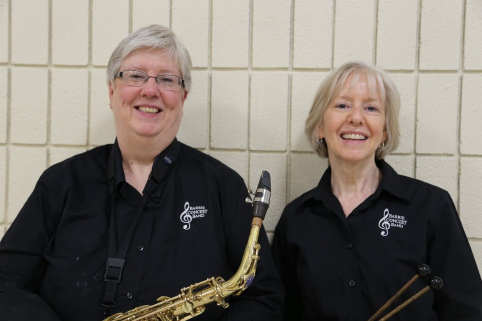 Sisters Jane Maxwell and Joan Maxwell-Gimpoli love playing in the Barrie Concert Band. Submitted photo