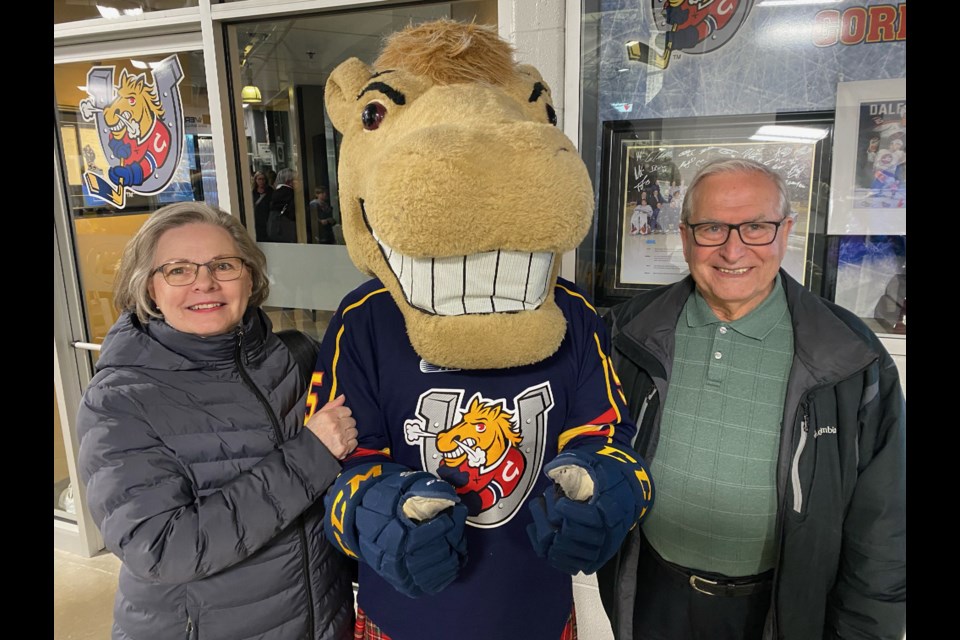 Barrie Colts forward Beau Jelsma’s grandparents, Darlene and Penny, pose with Charlie Horse before Thursday’s playoff opener. Their grandson scored twice and added two assists in a 10-2 win over the Hamilton Bulldogs.
