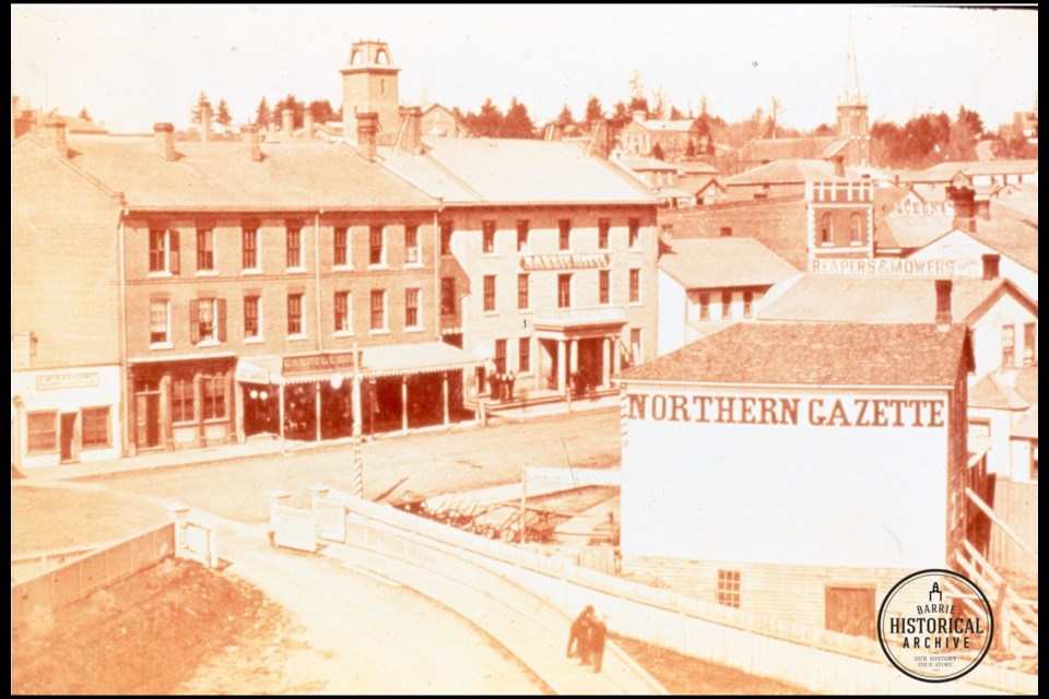 An early location of the Sanders shop in the centre portion of the McConkey building on Dunlop Street East, shown circa 1875.