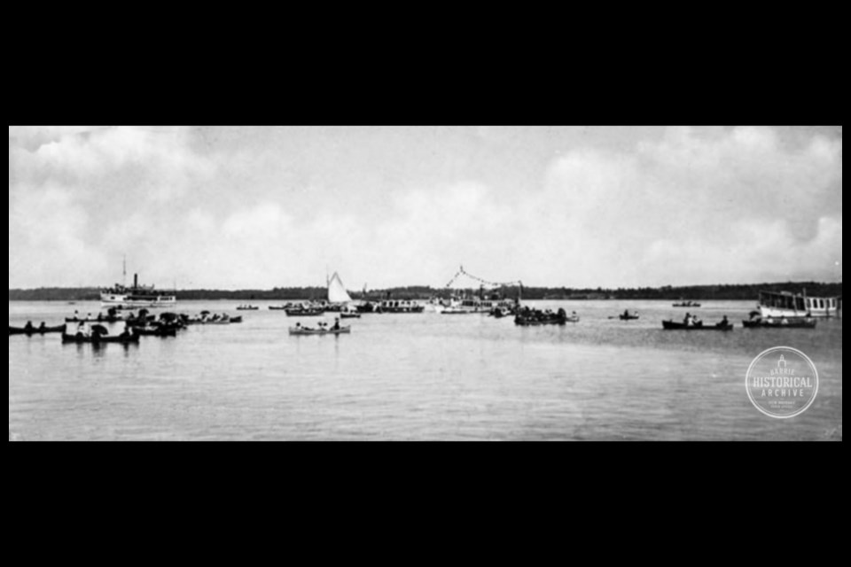 Sailboats, canoes and steamers on Kempenfelt Bay in the early 1900s.