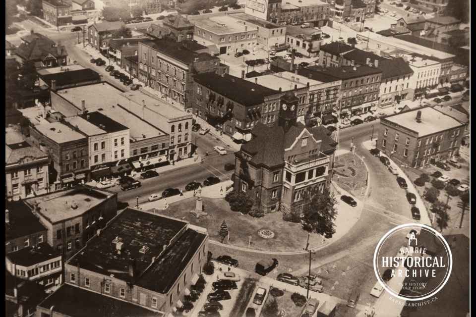 An aerial view, circa 1950, of what is now Meridian Place. The square building on the lower left was originally Nathaniel King's Gazette office and Music Hall.
