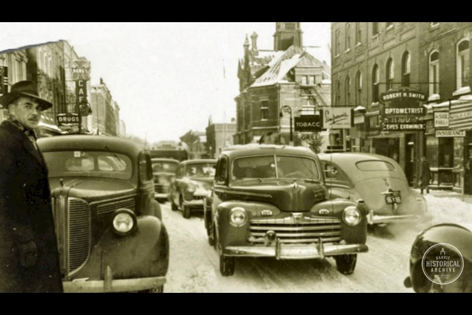 The Tobacco and Grill signs point to Jackson's Grill's location, circa 1946.