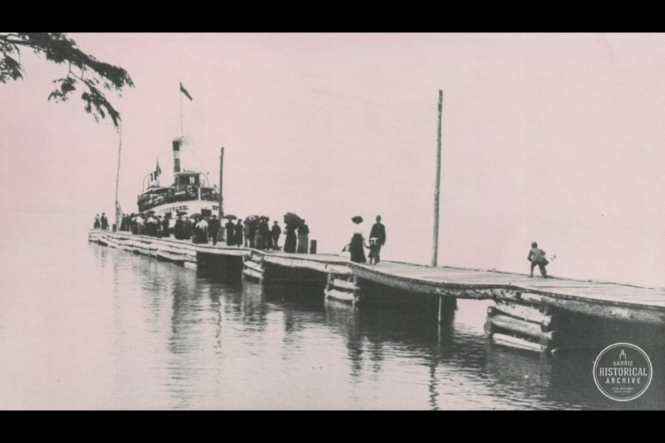 The steamer Enterprise is shown at the old wharf at Big Bay Point.