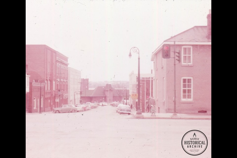 A sliver of 47 Collier St. is just visible on the far left of this 1960 photo showing the train station at the foot of Owen Street. Photo courtesy of the Barrie Historical Archive