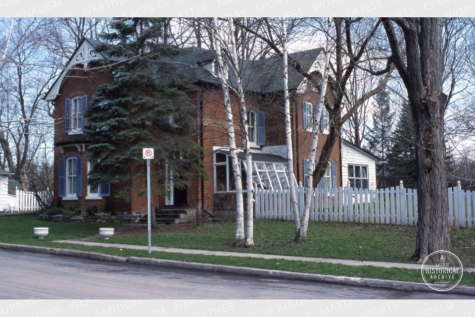 The home at 135 Mulcaster St., in the 1990s.