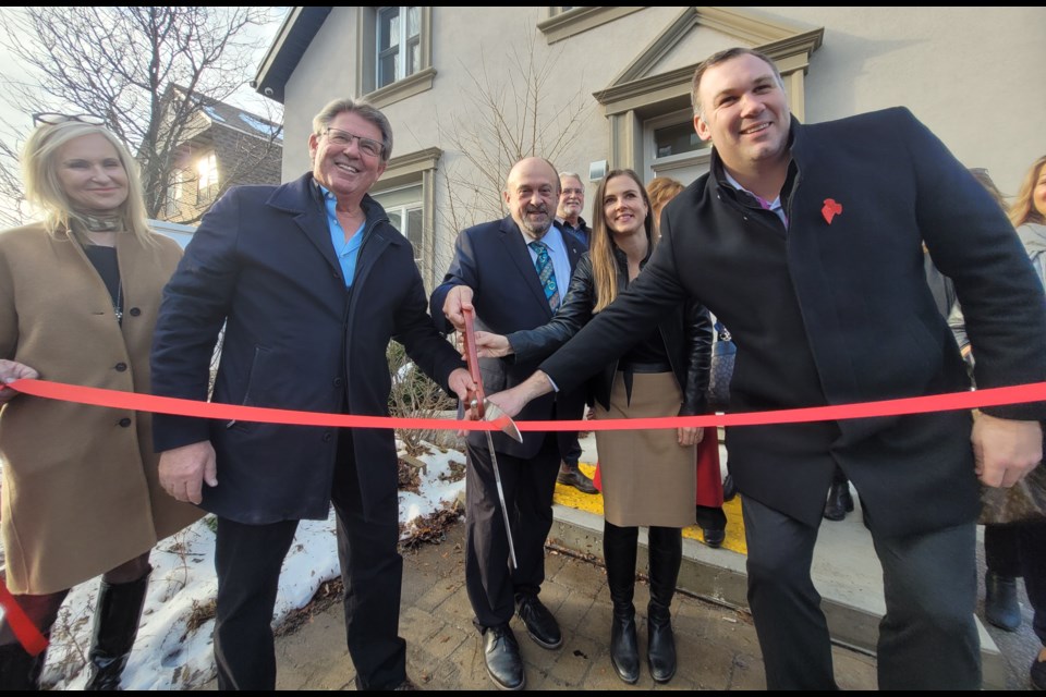 From left: Lori-Ann Seward (director of women’s residential programs), Blaine Hobson (co-founder and executive director), Associate Minister of Mental Health and Addictions Michael A. Tibollo, Barrie-Innisfil MPP Andrea Khanjin and Barrie Mayor Alex Nuttall cut the ribbon to officially open Cornerstone To Recovery, Thursday, Nov. 24, 2022.
