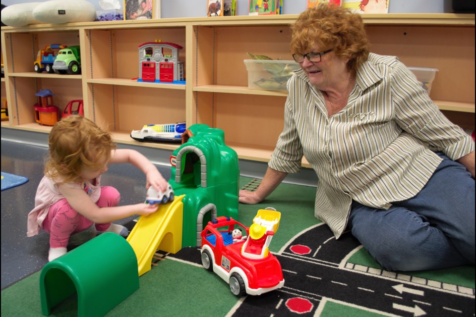 Prym Wanless, 2, and her grandmother Janet Barbon play with some toys at the EarlyON Centre in Barrie. Jessica Owen/BarrieToday