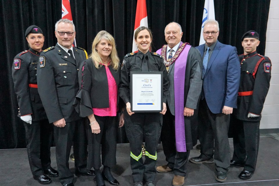 Megan Lorscheidt, centre, received a Chief's Commendation during the County of Simcoe Paramedic Services Commencement and Honours Ceremony. Jessica Owen/BarrieToday 