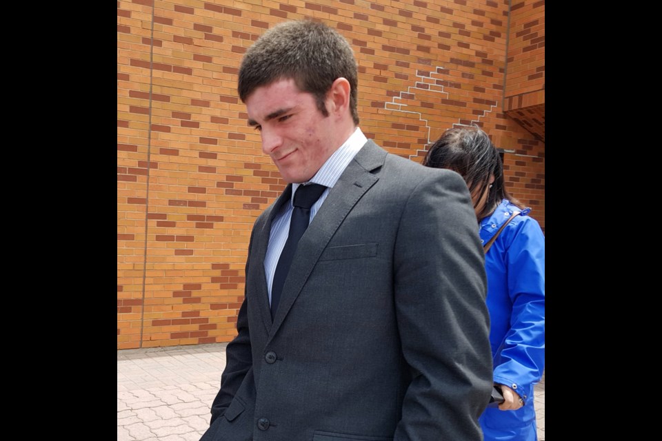 Noah Poisson leaves the Barrie courthouse on May 24, 2019. Shawn Gibson/BarrieToday