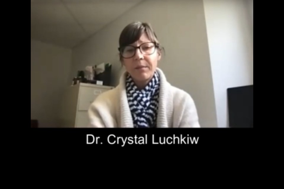 Dr. Crystal Luchkiw is shown in a screenshot. 