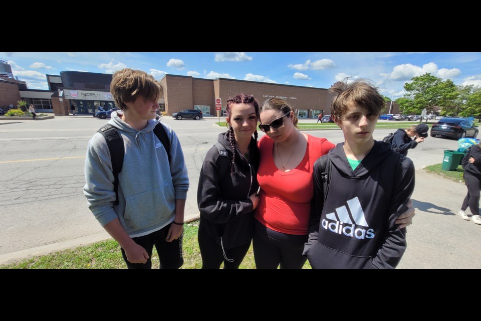 From left are Cody Hockley, Maddy Foerster, Caroline Foerster, and Ethan Greenhead. They were were all OK after Tuesday's scare at Eastview.